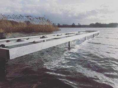 Installing the aluminium framed jetty at Budworth Sailing Club before laying the decking boards